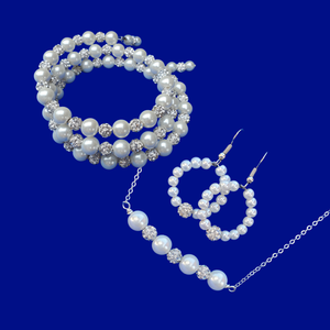 handmade pearl and crystal bar necklace accompanied by a multi-layer, expandable, wrap bracelet and a pair of hoop earrings