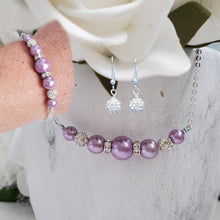 Load image into Gallery viewer, handmade pearl and crystal dainty bar necklace accompanied by a matching bracelet and a pair of dangle crystal earrings, lavender purple or custom color