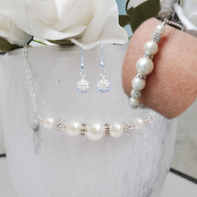 Load image into Gallery viewer, handmade pearl and crystal dainty bar necklace accompanied by a matching bracelet and a pair of dangle crystal earrings, white or custom color