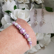 Load image into Gallery viewer, Handmade pearl and crystal dainty bar bracelet accompanied by a pair of dangle crystal earrings - lavender purple or custom color - Bracelets Sets - Gift For Bridesmaids - Bridal Sets