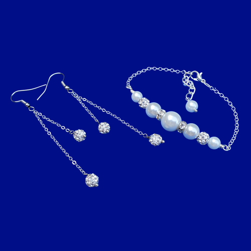 handmade pearl and crystal dainty bar bracelet accompanied by a pair of multi-stand crystal drop earrings