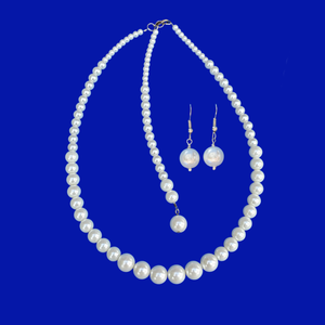 pearl necklace earring jewelry set with a 6 inch backdrop