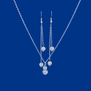 handmade crystal drop necklace accompanied by a pair of multi-strand drop earrings