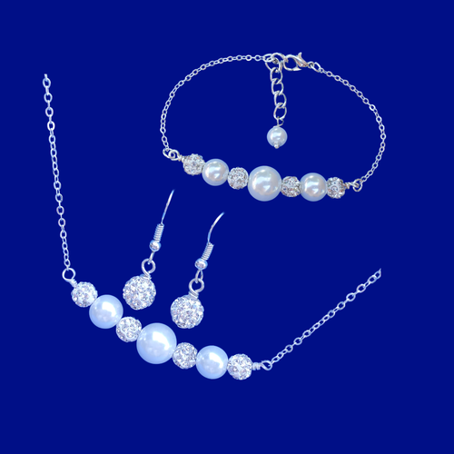 handmade pearl and crystal bar necklace accompanied by a matching bracelet and a pair of crystal drop earrings