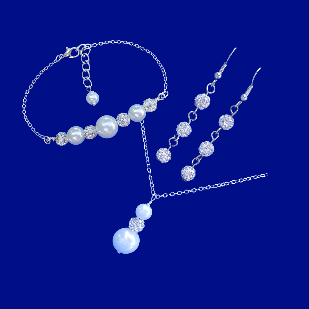 handmade pearl and crystal drop necklace accompanied by a bar bracelet and a pair of multi-strand crystal drop earrings
