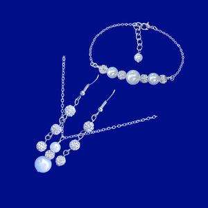 handmade pearl and crystal drop necklace accompanied by a matching bar bracelet and a pair of crystal drop earrings