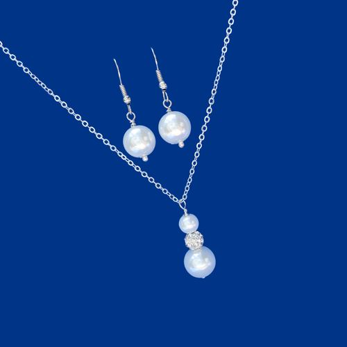handmade pearl and crystal drop necklace accompanied by a pair of pearl drop earrings