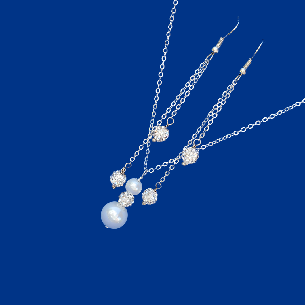 handmade pearl and crystal drop necklace accompanied by a pair of multi-strand crystal drop earrings
