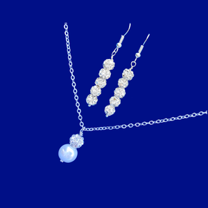 handmade pearl and crystal drop necklace accompanied by a pair of crystal drop earrings