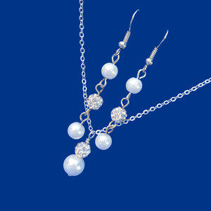 handmade pearl and crystal drop necklace accompanied by a pair of drop earrings