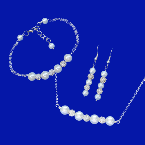 handmade pearl and crystal bar necklace accompanied by a matching bracelet and a pair of drop earrings