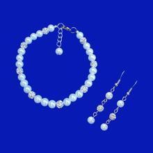 Load image into Gallery viewer, A handmade pearl and crystal bracelet accompanied by a pair of drop earrings. white and silver or custom color - Bracelet Sets - Bridal Sets - Pearl Set
