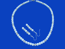 Load image into Gallery viewer, handmade pearl and crystal necklace accompanied by a pair of drop earrings