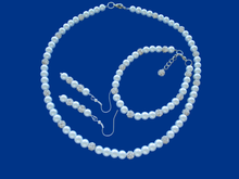 Load image into Gallery viewer, handmade crystal and pearl necklace accompanied by a matching bracelet and a pair of drop earrings