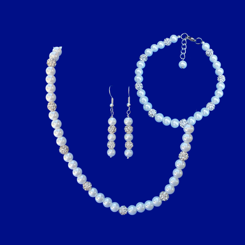 handmade crystal and pearl necklace accompanied by a matching bracelet and a pair of drop earrings