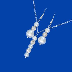 pearl and crystal drop necklace accompanied by a pair of drop earrings