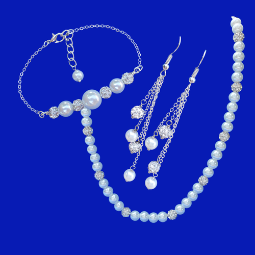 handmade pearl and crystal necklace accompanied by a bar bracelet and a pair of multi-strand drop earrings