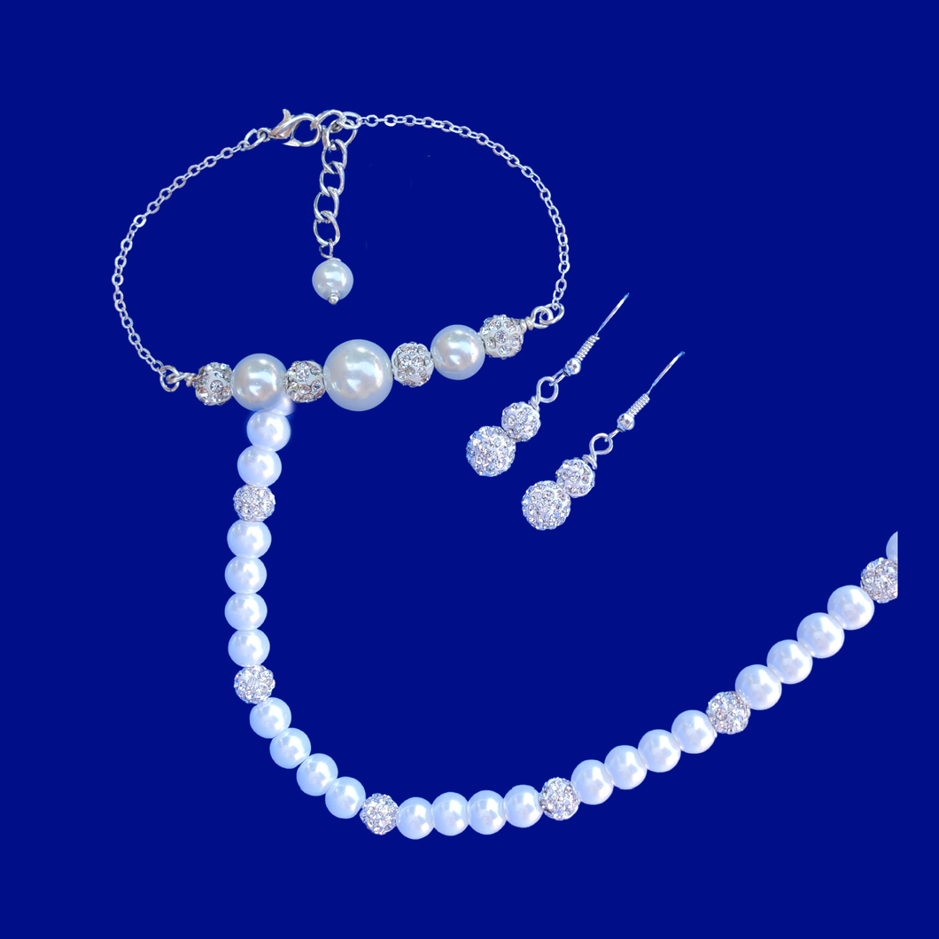 handmade pearl and crystal necklace accompanied by a bar bracelet and a pair of drop earrings