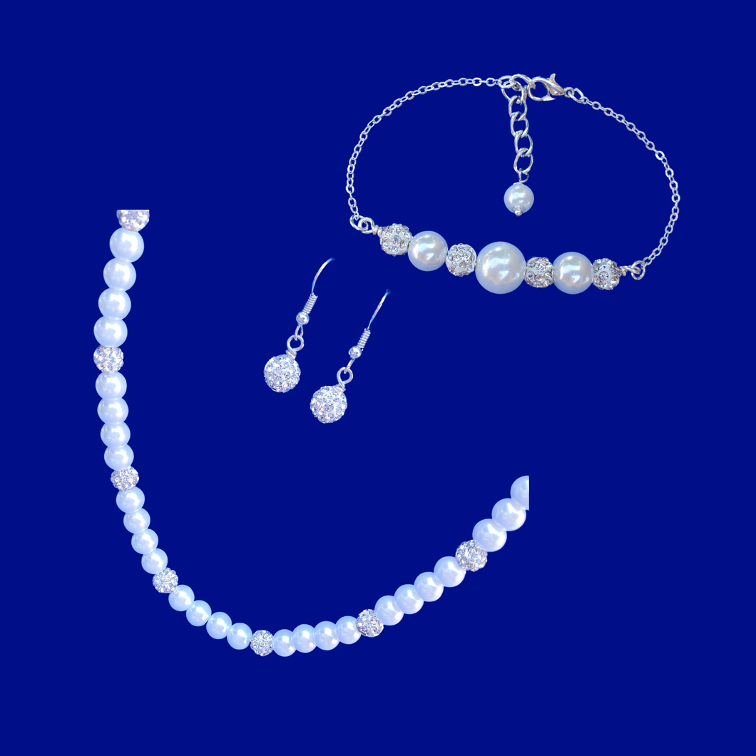 handmade pearl and crystal necklace accompanied by a bar bracelet and a pair of crystal drop earrings