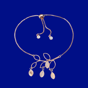 A beautiful handmade 18k family tree leaf charm bracelet. This stunning bracelet will make a gorgeous gift for your mother or grand mother! Each leaf represents the initial of a child or grand child.- Meaningful Gifts For Mom - Gifts For Mom - Bracelets