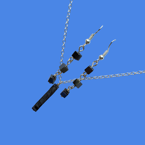 handmade hematite drop necklace accompanied by a pair of drop earrings
