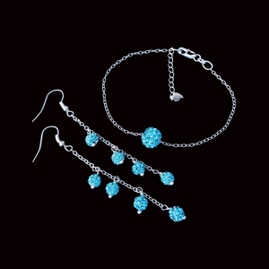 handmade floating crystal bracelet accompanied by a matching pair of drop earrings