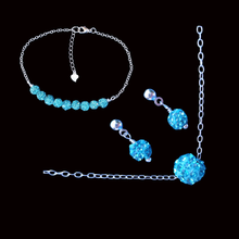 Load image into Gallery viewer, handmade floating crystal necklace accompanied by a bar bracelet and a pair of earrings
