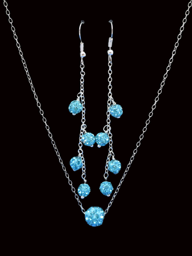 handmade floating crystal necklace accompanied by a pair of drop earrings