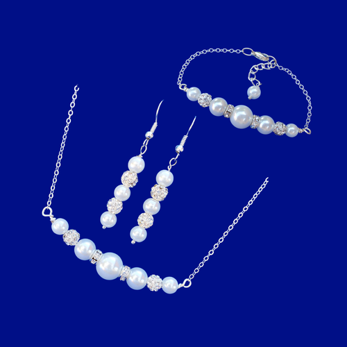 handmade pearl and crystal bar necklace accompanied by a matching bar bracelet and a pair of drop earrings