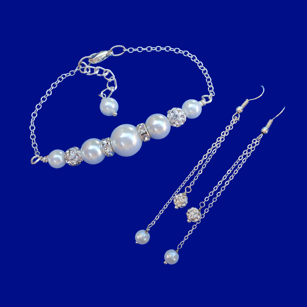 pearl and crystal bar bracelet accompanied by a matching pair of multi-strand drop earrings