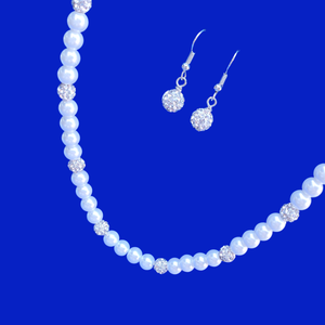 handmade pearl and crystal necklace accompanied by a pair of drop crystal earrings
