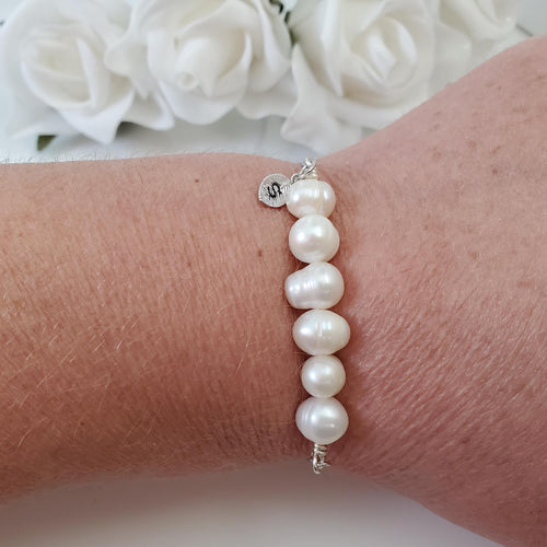 handmade 18k fresh water pearl monogram leaf bracelet in rhodium