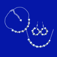 Load image into Gallery viewer, Fresh Water Pearl Set - Necklace Set - Bridal Sets - handmade floral fresh water pearl bar necklace accompanied by a matching bracelet and a pair of hoop earrings, ivory and silver or ivory and gold