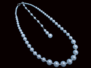 handmade silver accented pearl necklace with 6 inch backdrop