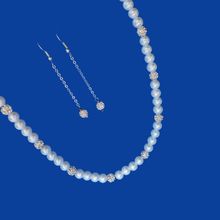 Load image into Gallery viewer, A handmade pearl and crystal necklace accompanied by a pair of crystal drop earrings