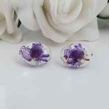 Load image into Gallery viewer, Flower Stud Earrings, Earrings, Oval Earrings - handmade resin oval stud earrings with lavender flowers and silver flakes