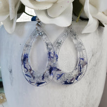 Load image into Gallery viewer, handmade real flower resin teardrop stud earrings made with blue cornflower and silver flakes. - Flower Earrings - Bridesmaid Gifts - Teardrop Earrings