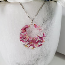 Load image into Gallery viewer, Handmade real flower circle pendant necklace made with red clover flowers and silver flakes preserved in resin. - Dried Flower Pendant, Flower Necklace, Necklaces