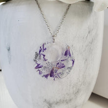 Load image into Gallery viewer, Handmade real flower circle pendant necklace made with statice and silver flakes preserved in resin. - Dried Flower Pendant, Flower Necklace, Necklaces