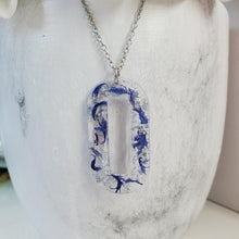 Load image into Gallery viewer, Handmade real flower rectangular pendant necklace made with blue cornflower and silver flakes. Flower Necklace, Rectangular Necklace, Necklaces