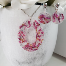 Load image into Gallery viewer, Handmade real flower oval drop pendant necklace accompanied by a by of dangling stud earrings made with red clover flowers and silver flakes preserved in resin. - Flower Jewelry, Bridesmaid Gifts, Jewelry Sets
