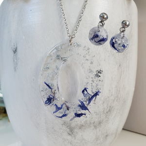 Handmade real flower oval drop pendant necklace accompanied by a by of dangling stud earrings made with blue cornflower and silver flakes preserved in resin. - Flower Jewelry, Bridesmaid Gifts, Jewelry Sets