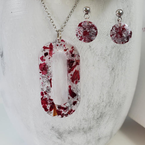 Handmade real flower oval pendant necklace accompanied by a pair of circular stud earrings made with rose petals and silver flakes. Jewelry Sets, Flower Jewelry, Necklace Set