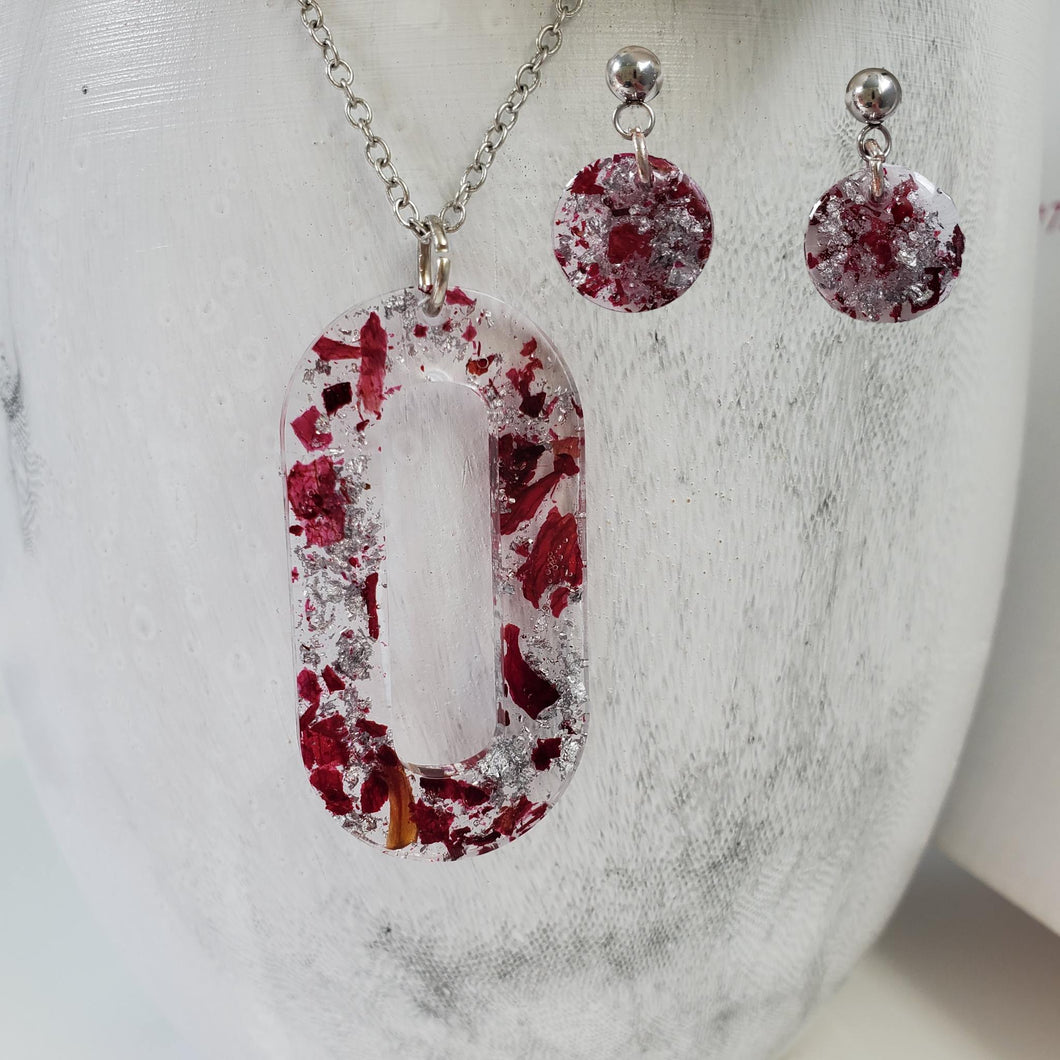 Handmade real flower oval pendant necklace accompanied by a pair of circular stud earrings made with rose petals and silver flakes. Jewelry Sets, Flower Jewelry, Necklace Set