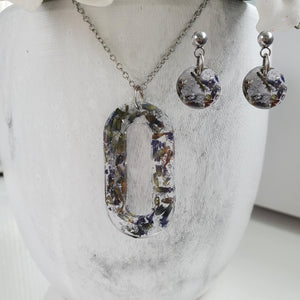 Handmade real flower oval pendant necklace accompanied by a pair of circular stud earrings made with lavender petals and silver flakes. Jewelry Sets, Flower Jewelry, Necklace Set