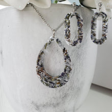 Load image into Gallery viewer, Handmade real flower teardrop pendant necklace accompanied by a pair of oval stud earrings made with lavender petals and silver flakes preserved in resin. Necklace And Earring Set, Resin Flower Jewelry