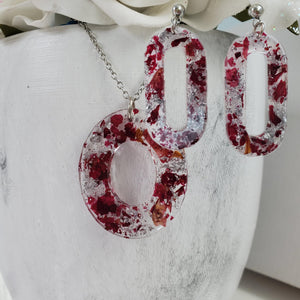 Handmade real flower oval pendant necklace accompanied by a pair of stud dangling earrings made with rose petals and silver flakes preserved in resin. Resin Flower Jewelry - Necklace And Earring Set