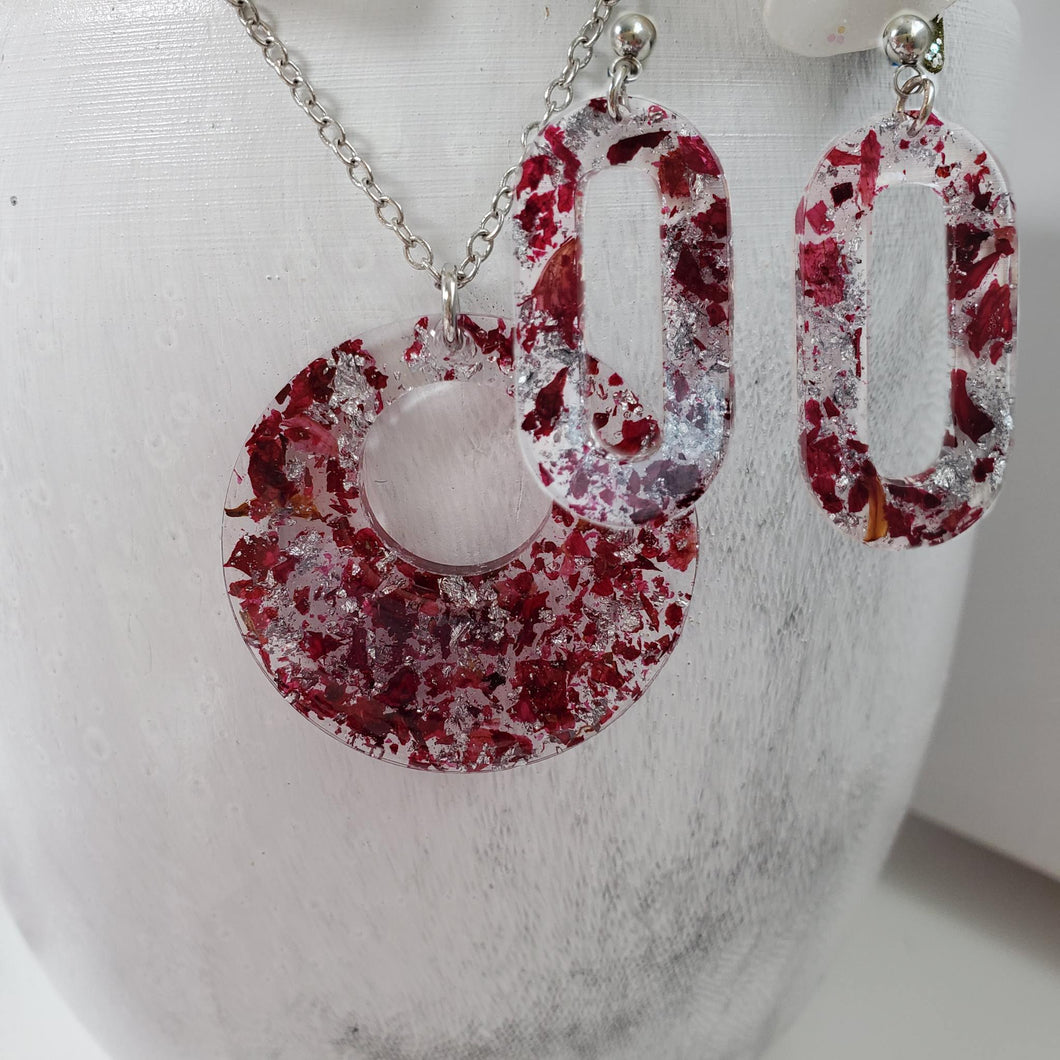 Handmade real flower circular pendant necklace accompanied by a pair of oval stud drop earrings made with rose petals and silver flakes preserved in resin. Resin Flower Jewelry, Bridal Sets, Jewelry Sets