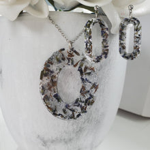 Load image into Gallery viewer, Handmade real flower oval pendant necklace accompanied by a pair of oval stud earrings made with lavender petals and silver flakes preserved in resin. Necklace Set - Resin Flower Jewelry - Flower Jewelry
