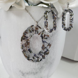 Handmade real flower oval pendant necklace accompanied by a pair of oval stud earrings made with lavender petals and silver flakes preserved in resin. Necklace Set - Resin Flower Jewelry - Flower Jewelry